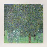 Rosebushes Under The Trees, Gustav Klimt Jigsaw Puzzle<br><div class="desc">Gustav Klimt (July 14, 1862 – February 6, 1918) was an Austrian symbolist painter and one of the most prominent members of the Vienna Secession movement. Klimt is noted for his paintings, murals, sketches, and other objets d'art. In addition to his figurative works, which include allegories and portraits, he painted...</div>