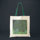 Rosebushes Under The Trees, Gustav Klimt Tote Bag<br><div class="desc">Gustav Klimt (July 14, 1862 – February 6, 1918) was an Austrian symbolist painter and one of the most prominent members of the Vienna Secession movement. Klimt is noted for his paintings, murals, sketches, and other objets d'art. In addition to his figurative works, which include allegories and portraits, he painted...</div>