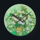 Roses by Vincent van Gogh Round Wall Clock<br><div class="desc">Roses painted by Dutch painter Vincent van Gogh in 1890 is a classic masterpiece.  Enjoy this clock with van Gogh's unique style of painting. This still life of a vase of white roses is painted beautifully in shades of white and green.</div>