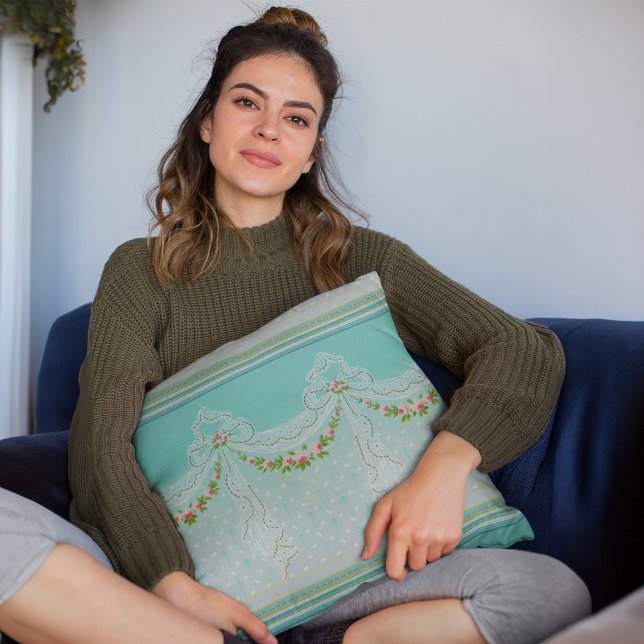 Roses Garlands Lacy Swags Bow Knots Homedecor Cushion (mockup of a woman holding a Roses Garlands Lacy Swags Bow Knots Homedecor Throw Pillow)