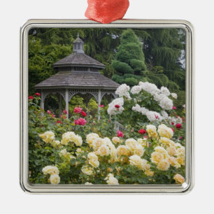 Roses in bloom and Gazebo Rose Garden at the Metal Tree Decoration