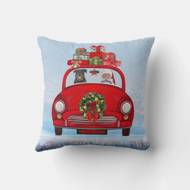 Rottweiler Dog In Car With Santa Claus Cushion (Back)