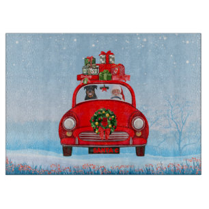 Rottweiler Dog In Car With Santa Claus Cutting Board