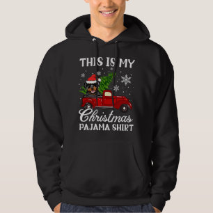 Rottweiler Dog Riding Red Truck With Christmas Tre Hoodie