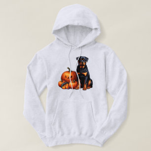 Rottweiler Dog Sitting by Halloween Pumpkins Hoodie