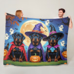 Rottweiler Dogs Pumpkin Halloween Funny  Fleece Blanket<br><div class="desc">A playful Halloween scene featuring a mischievous little pup peeking out of a carved pumpkin,  surrounded by spooky-fun fall vibes. With cheeky charm and autumn colours,  it’s the perfect touch of humour for the season.</div>