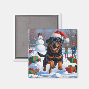 Rottweiler Running in Snow with Christmas Hat Magnet