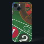 Roulette Table with Chips and Wheel iPhone 13 Case<br><div class="desc">The spinning wheel holds all the power on the roulette table, but the power of this painting is in the lifelike depiction of a casino scene. The green of the felt and the colour of the chips puts you at the table, waiting on your bet to pay off. Be sure...</div>
