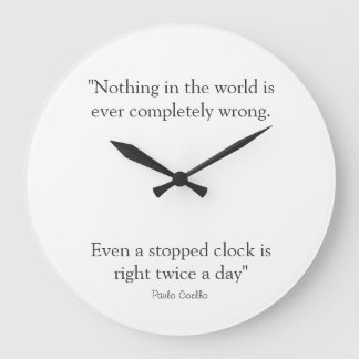 Round Clock with Paulo Coelho Quote