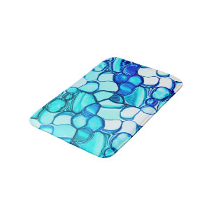 Round like stones in tones similar to aquamarine bath mat