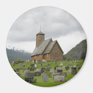 Round magnet stave church with graveyard in Norway