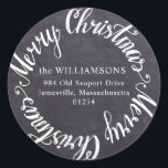 Round Merry Christmas Chalkboard Address Label<br><div class="desc">Add this round address label to the back of your Christmas card mailing and it will double as an envelope seal. The black chalkboard background will look great on any colour envelope. Merry Christmas is written in a bright white script font. Your family name and address are written on the...</div>