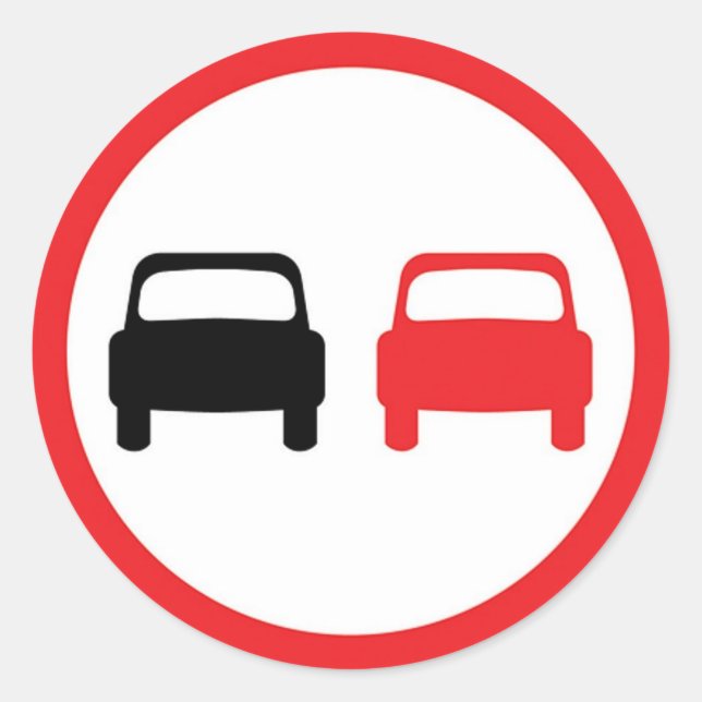 Round sticker with no overtaking traffic sign. (Front)