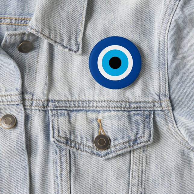 Round typical Blue Mati Evil Eye pinback buttons (In Situ)