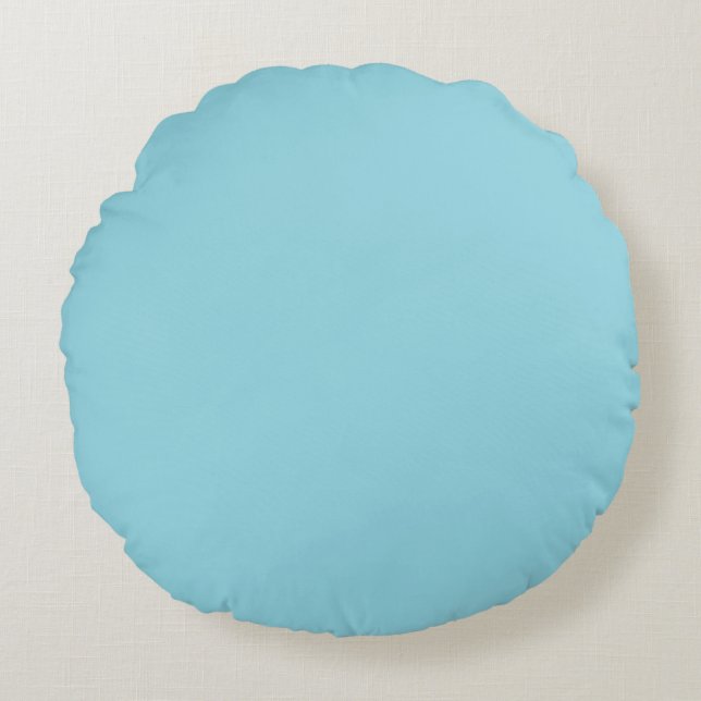 rounded cloud-like shape on light grey round cushion (Front)