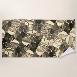 Rounded shapes in bronze colour, glossy light gold beach towel