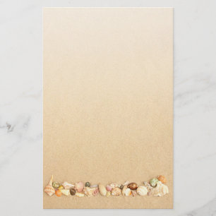 Row of Seashells on Beach sand Stationery