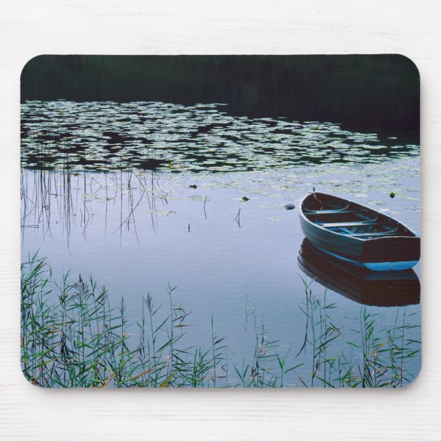 Rowboat on small lake surrounded by water mouse pad (Front)
