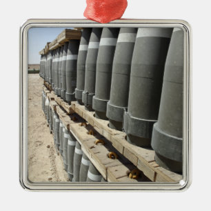Rows of ammunition are stacked and prepped metal tree decoration
