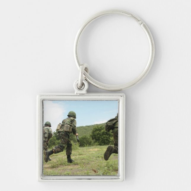 Royal Thai Marines rush forward to secure the s Key Ring (Front)