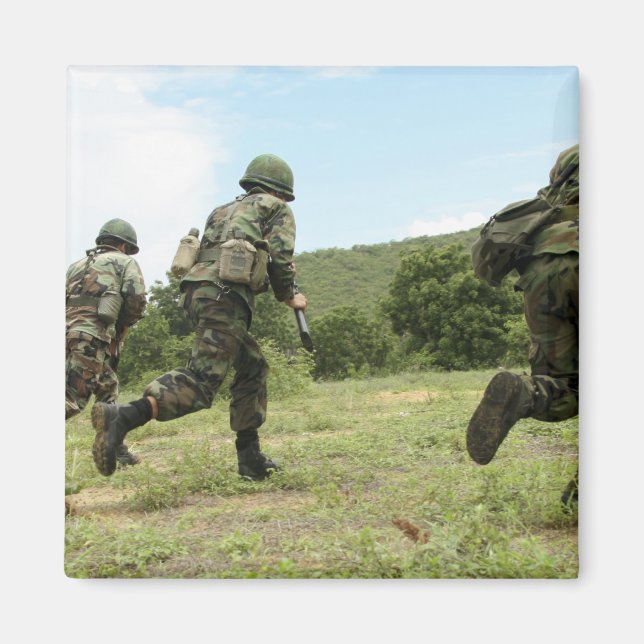 Royal Thai Marines rush forward to secure the s Magnet (Front)