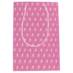 Runner silhouette drawing on pink background medium gift bag
