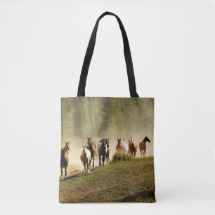 Running horses on Montana ranch Tote Bag