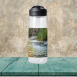 Running River Rumi Poetry Verse Water Bottle<br><div class="desc">Stay quenched wherever you go with this clear, plastic water bottle that features the photo image of a running river along with an inspirational poetry verse by Rumi, a famous Persian poet of the 13th century. Select your water bottle size and colour. NOTE: Design not optimised for child's water bottle...</div>