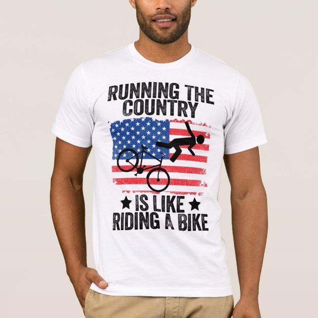 Running The Country Is Like Riding A Bike T-Shirt (Front)