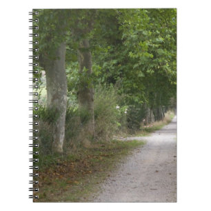 Rural dirt country road near the town of notebook
