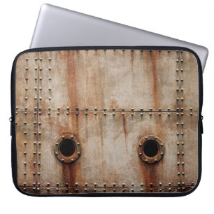RUST AND TEXTURE ON METAL PLATE SIDES OF STAGED SH LAPTOP SLEEVE