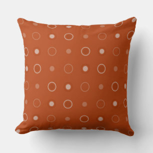Rust, and white dots cushion