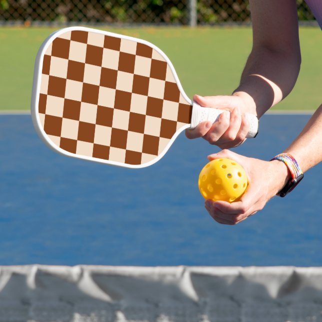 Rust brown and beige checkerboard pattern pickleball paddle (Insitu)