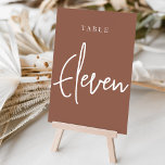 Rust Hand Scripted Table ELEVEN Table Number<br><div class="desc">Simple and chic table number cards in earth tone rust brown and white make an elegant statement at your wedding or event. Design features "table [number]" in an eyecatching mix of classic serif and handwritten script lettering. Design repeats on both sides. Individually numbered cards sold separately; order each table number...</div>