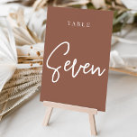 Rust Hand Scripted Table SEVEN Table Number<br><div class="desc">Simple and chic table number cards in earth tone rust brown and white make an elegant statement at your wedding or event. Design features "table [number]" in an eyecatching mix of classic serif and handwritten script lettering. Design repeats on both sides. Individually numbered cards sold separately; order each table number...</div>