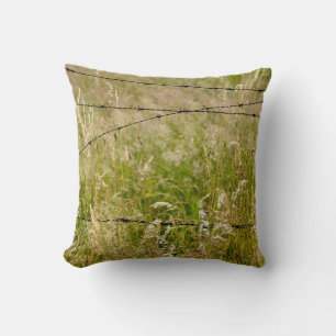 Rusted barbed wire fence cushion