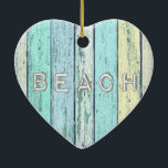 Rustic Beach Driftwood Ceramic Tree Decoration<br><div class="desc">The ocean is calling! Sit back, relax, and feel the cool sea breeze on your skin. Take a deep breath and forget your troubles. Those are the images that inspired this rustic coastal artwork. The word "Beach" is etched in nautical driftwood painted in the colours of light blue, sea green,...</div>