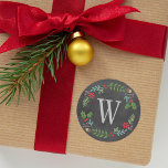 Rustic Black Chalkboard Monogram Holiday Wreath Classic Round Sticker<br><div class="desc">Rustic chalkboard style holiday sticker design features a woodland floral wreath with monogram initial. The wreath includes Christmas holly leaves, berries, pine tree branches, and acorns that frame the letter. The background has a black chalkboard textured appearance. Design includes red, dusty purple, green, ice blue, brown, gray, & soft black....</div>