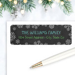 Rustic Black Chalkboard Snowflake Return Address<br><div class="desc">Dress up your envelopes in style this holiday season!  The label design features blue and green text (can be customised) on a rustic black chalkboard style background.  White sketched snowflakes surround custom text that can be personalised with your family / last name and return address.</div>