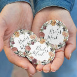 Rustic Bloom Bridesmaid 6 Cm Round Badge<br><div class="desc">Identify the key players at your bridal shower or rehearsal dinner with our elegant,  sweetly chic floral buttons. Button features a watercolor floral wreath of roses,  peonies and mums in rich autumn hues,  with "bridesmaid" inscribed inside in hand lettered script. Designed to match our Rustic Bloom collection.</div>