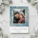 Rustic Blue Snow Photo Winter Christmas<br><div class="desc">Share your holiday cheer in style with this winter wonderland Christmas card, featuring a frosty teal and white modern snowfall background and a rounded corner silver foil frame for your favourite family or couple photo. Elegant silver foil script on a soft white background delivers your holiday greetings, while your last...</div>