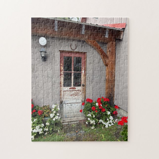 Rustic building with old door jigsaw puzzle (Vertical)