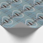 Rustic Country barn door wedding keepsake Wrapping Paper<br><div class="desc">An old rustic barn door. The door as old flaking blue paint entrusted metal latch. A soft white heart forms the centre of this wedding design. The design has the bride and groom's name and has a keepsake for people who attended your wedding. It also has the bride and groom's...</div>