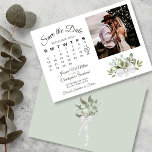 Rustic Eucalyptus Greenery Calendar Photo Wedding Save The Date<br><div class="desc">This beautiful wedding Save the Date card features a rustic boho chic design with a cluster of hand painted watercolor eucalyptus leaves and greenery in shades of mint, moss, and sage green. The left side of the card is a calendar that you can customize with a heart around your wedding...</div>