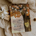 Rustic Fall Autumn Tree Twinkle Lights Wedding Invitation<br><div class="desc">Invite your wedding guests to a magical autumnal celebration with these gorgeous woodland wedding invitations. Featuring a charming rustic fall tree with its branches adorned in vibrant red, orange and yellow leaves, as well as a twinkling string of fairy lights and a delicately carved wooden heart with your initials, these...</div>