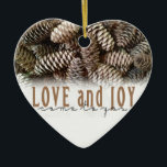 Rustic Holiday Love and Joy Pine Cone Ceramic Tree Decoration<br><div class="desc">Festive,  rustic pine cones accentuate this classic,  elegant design wishing holiday Love and Joy.</div>
