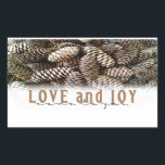 Rustic Holiday Love and Joy Pine Cone Rectangular Sticker<br><div class="desc">Festive,  rustic pine cones accentuate this classic,  elegant design wishing holiday Love and Joy.</div>
