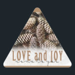 Rustic Holiday Love and Joy Pine Cone Triangle Sticker<br><div class="desc">Festive,  rustic pine cones accentuate this classic,  elegant design wishing holiday Love and Joy.</div>