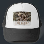 Rustic Holiday Love and Joy Pine Cone Trucker Hat<br><div class="desc">Festive,  rustic pine cones accentuate this classic,  elegant design wishing holiday Love and Joy.</div>