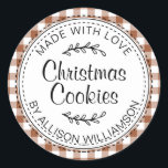Rustic Homemade Christmas Cookies TerraCotta Check Classic Round Sticker<br><div class="desc">Rustic, modern and simple homemade baked goods apple pie sticker with the text made with love, Christmas cookies and your name in elegant handwritten script calligraphy and typography on a terracotta check pattern background with a stylish touch of foliage. Simply add your name and the product name to the label....</div>